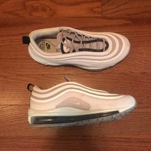 Pinkish purplish Nike shoes